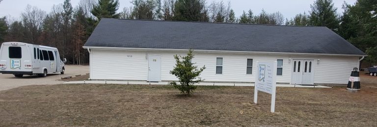 Building and bus 768x259